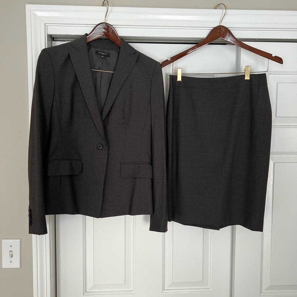 Ann Taylor gray pinstriped suit. Jacket size 6,  skirt size 4